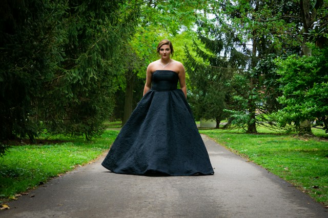 žena